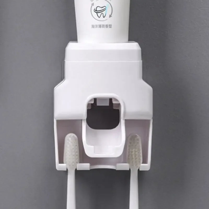 Dispenser automatico di dentifricio per WC Dispenser automatico di dentifricio per pasta a parete Accessori per il bagno Estrusore automatico