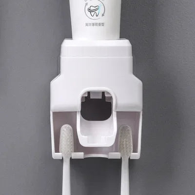 Dispenser automatico di dentifricio per WC Dispenser automatico di dentifricio per pasta a parete Accessori per il bagno Estrusore automatico