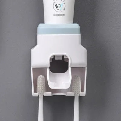 Dispenser automatico di dentifricio per WC Dispenser automatico di dentifricio per pasta a parete Accessori per il bagno Estrusore automatico